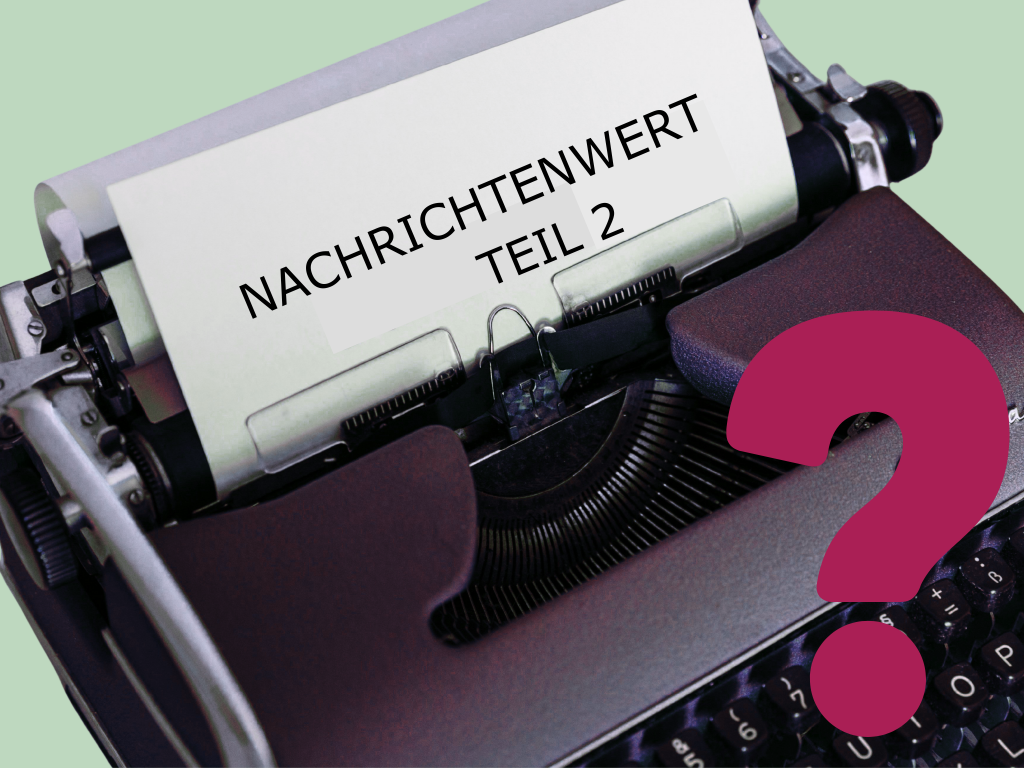 Schreibmaschine auf grünem Grund, auf einem Blatt steht Nachrichtenwert Teil 2.